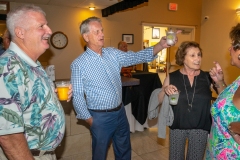 Steve Walter, Wayne and Rena Walters awaiting the arrival of the guest of honor, Joe Walters